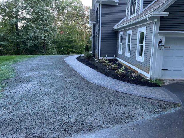 Reliable landscaper near Bedford NH for residential walkway and plant install.