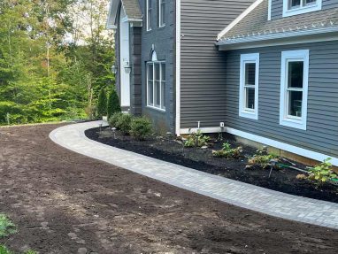 Reliable landscaper near Bedford NH for residential walkway and plant install.
