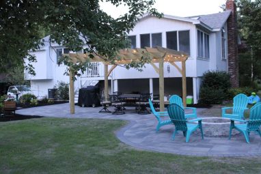 Reliable landscaper near Derry NH for residential patio and firepit install, and lawn renovation with hydroseeding.