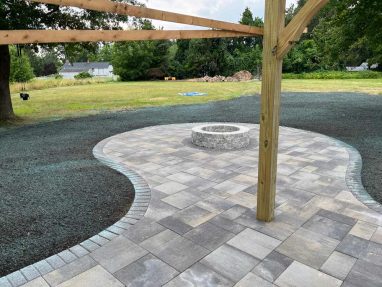 Reliable landscaper near Derry NH for residential patio and firepit installation, and lawn renovation with hydroseeding