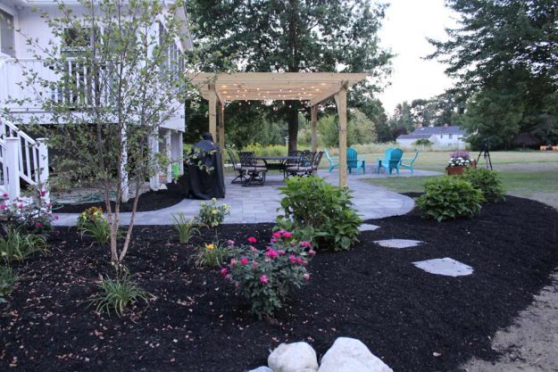 Reliable landscaper near Derry NH for residential patio installation, plant installation, and mulching.