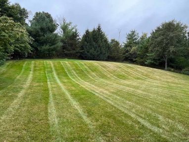 Reliable landscaper near Derry NH for residential lawn mowing.
