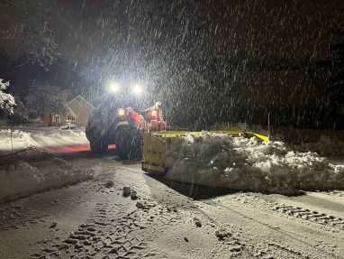 Reliable landscaper near Manchester NH for commercial snow removal with a loader