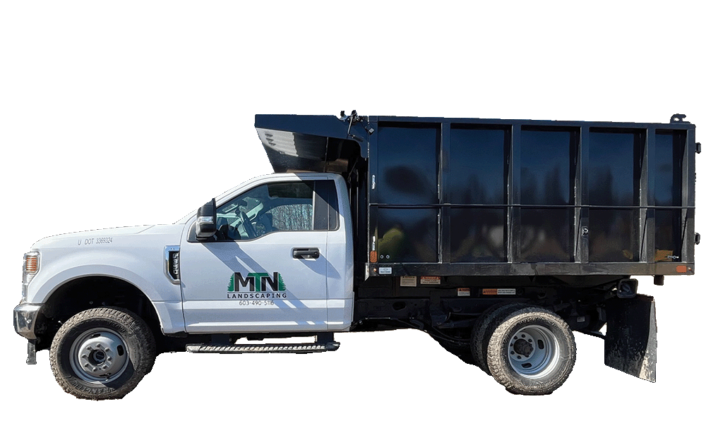 MTN Landscaping’s material delivery truck ready for transporting mulch, gravel, and loam across New Hampshire