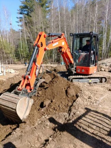 Reliable landscaper near Fremont NH for patio installation with retaining wall.