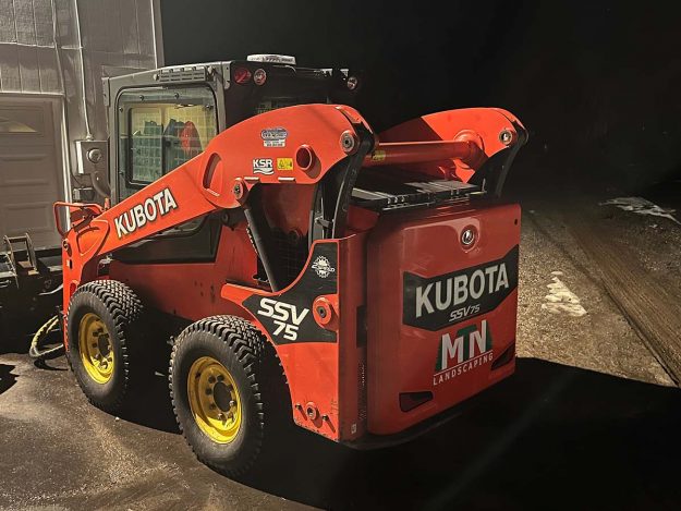 Reliable landscaper near Manchester NH for commercial snow removal with a skidsteer