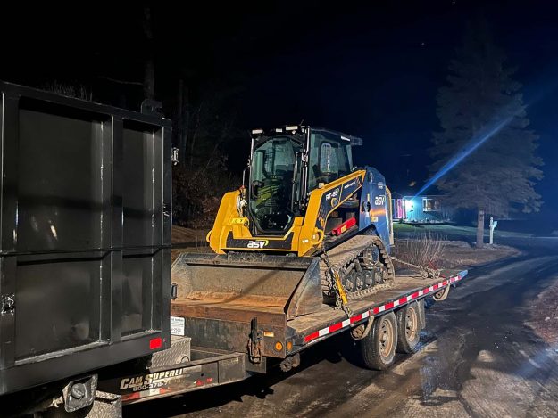 Reliable landscaper near Manchester NH for commercial snow removal with a skidsteer